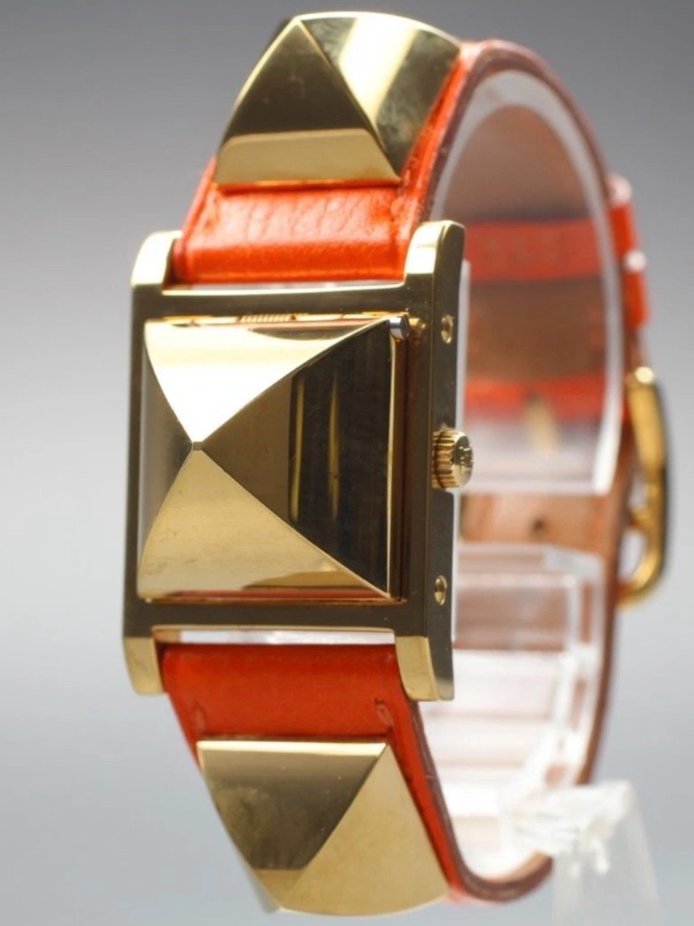 Hermès Gold Pyramid Stud Watch with Orange Leather Strap